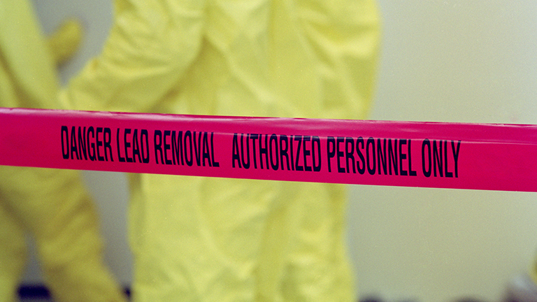 Hazmat Suit Workers in Lead environment